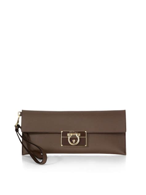 ferragamo clutch|More.